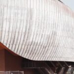 Modern Rome - Creative design of contemporary music complex facades and staircase under light sky in sunlight in Rome Italy