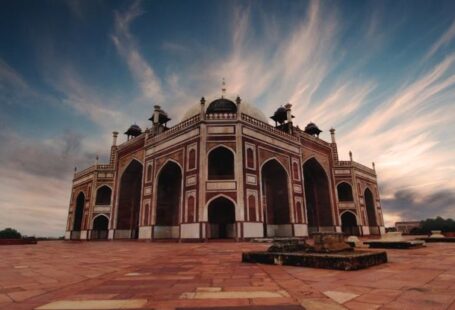 Heritage - Brown and Black Mosque Under White and Blue Cloudy Sky