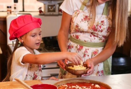 Cooking Classes - Mother and Daughter Cooking in the Kitchen