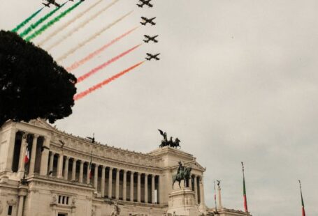 National Day Of Italy - Air show above Victor Emmanuel Monument with sculptures in city