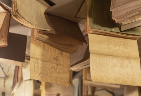 Bookshops - Books hanging from the ceiling in a library